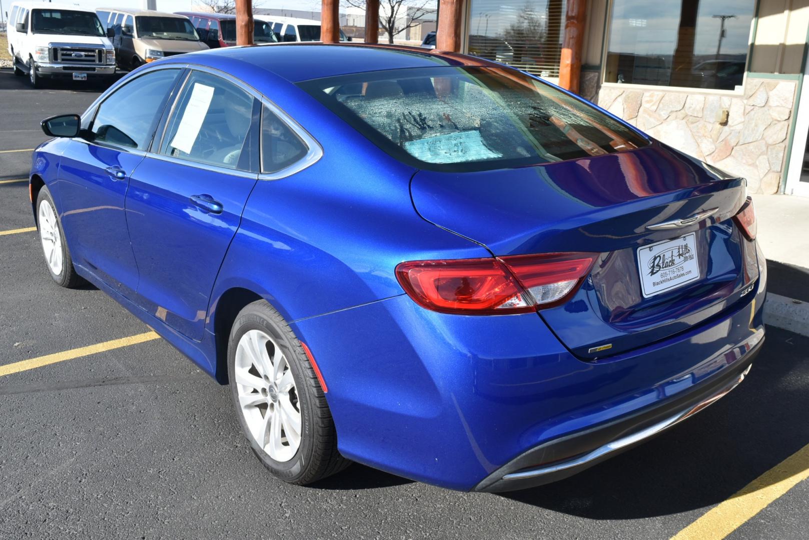 2016 Blue /White Chrysler 200 Limited (1C3CCCAB6GN) with an 2.4L 4 Cyl Multiair engine, 9-Speed Automatic transmission, located at 1600 E Hwy 44, Rapid City, SD, 57703, (605) 716-7878, 44.070232, -103.171410 - Photo#5